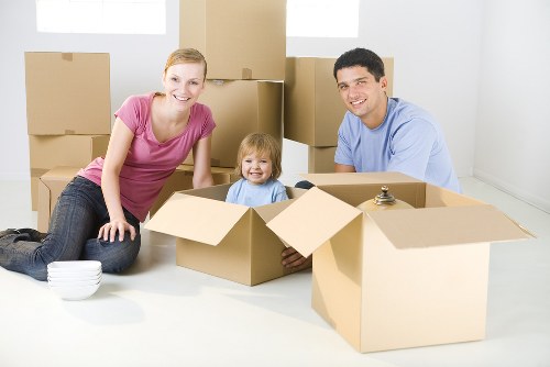 Removal team loading household items into a vehicle