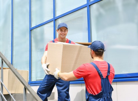 Man and van loading items in a Notting Hill residential street