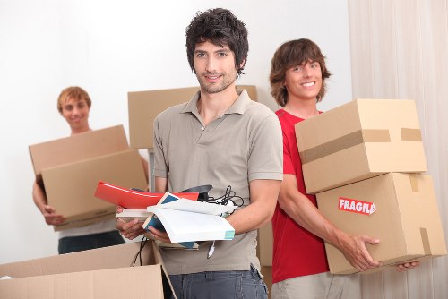 Packing and loading items into a van for a local move