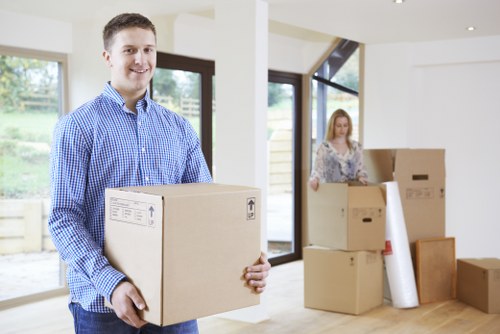 Local office relocation team handling equipment in West London