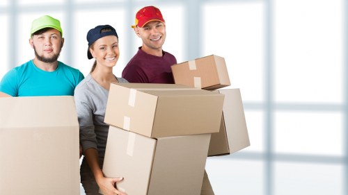 Removal crew handling furniture with care