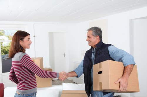 Staff member handling furniture carefully during a move