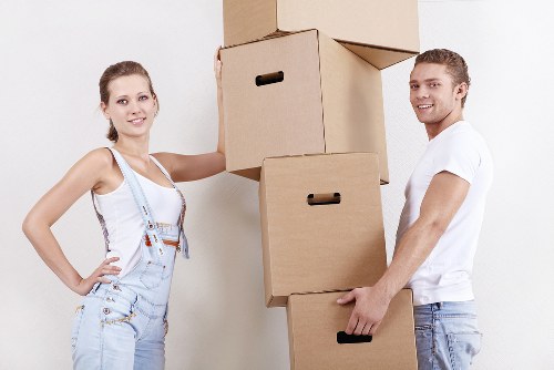 Furniture and boxes being loaded into a moving van for a local move